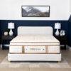 Organic Meadow hybrid Plush organic mattress on a bed frame.