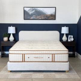 Organic Meadow hybrid medium organic mattress on a bed frame.