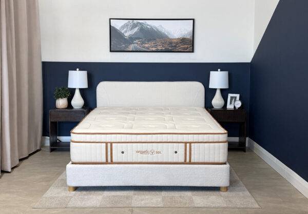 Organic Meadow hybrid medium organic mattress on a bed frame.