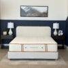 Organic Meadow hybrid firm organic mattress on a bed frame.