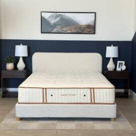 Organic Meadow hybrid firm organic mattress on a bed frame.