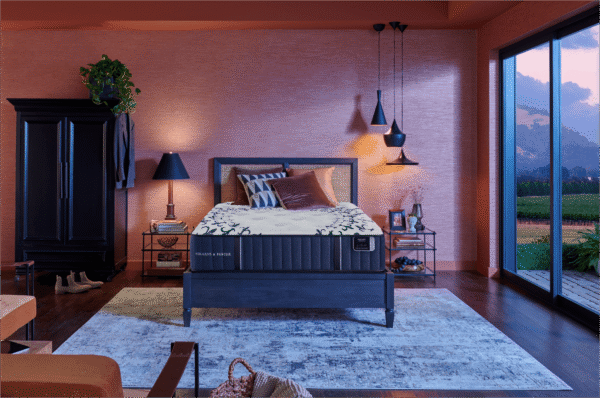 Stearns & Foster Estate Tight Top Luxury Firm Mon Trésor mattress displayed on a modern bed frame inside a luxury contemporary bedroom.