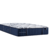 Stearns & Foster Estate Tight Top Luxury Firm Mon Trésor 13.5-inch mattress featuring a handcrafted quilted sleep surface and premium blue upholstered border.