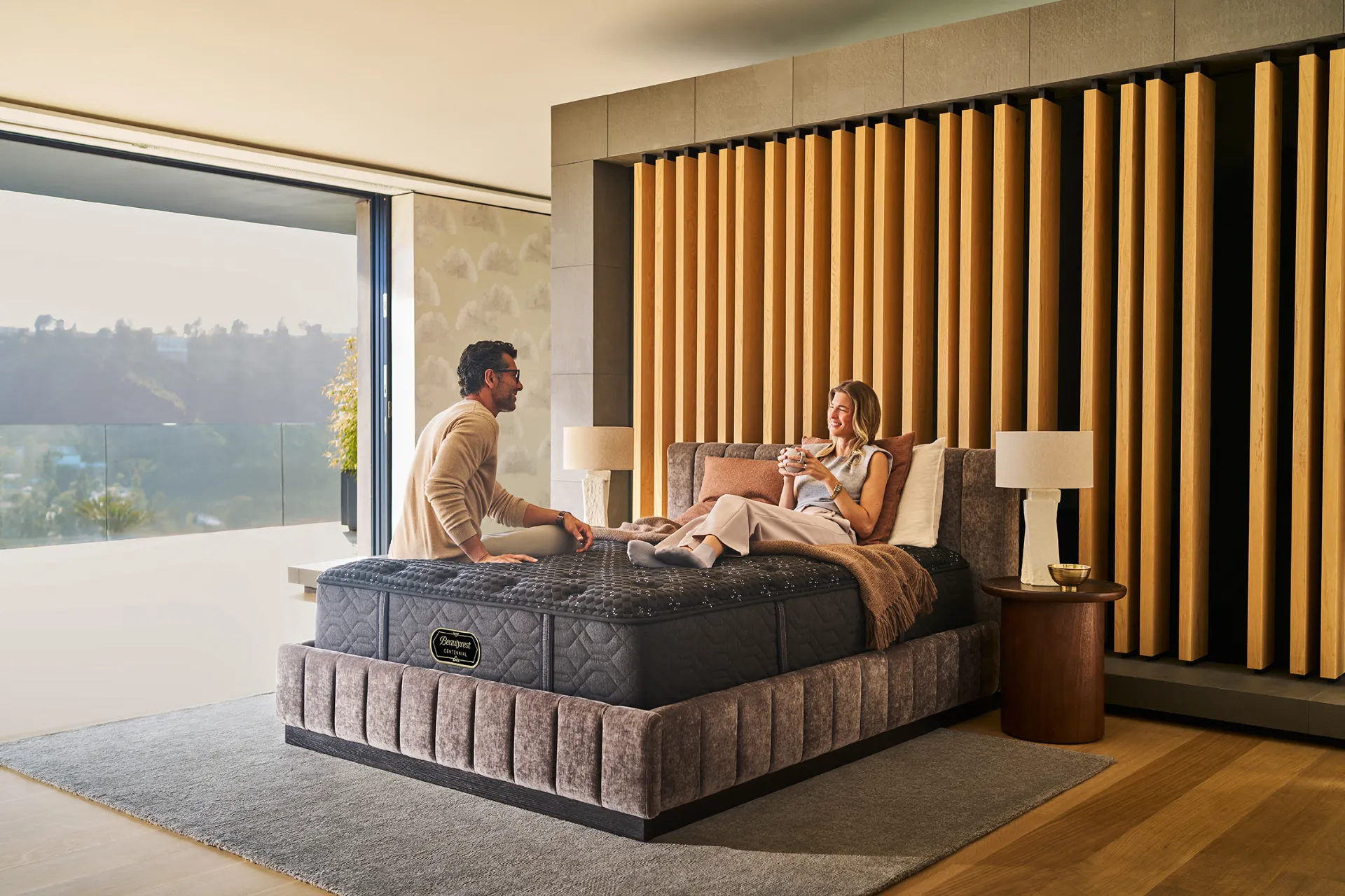 Couple relaxing on a Beautyrest Centennial mattress