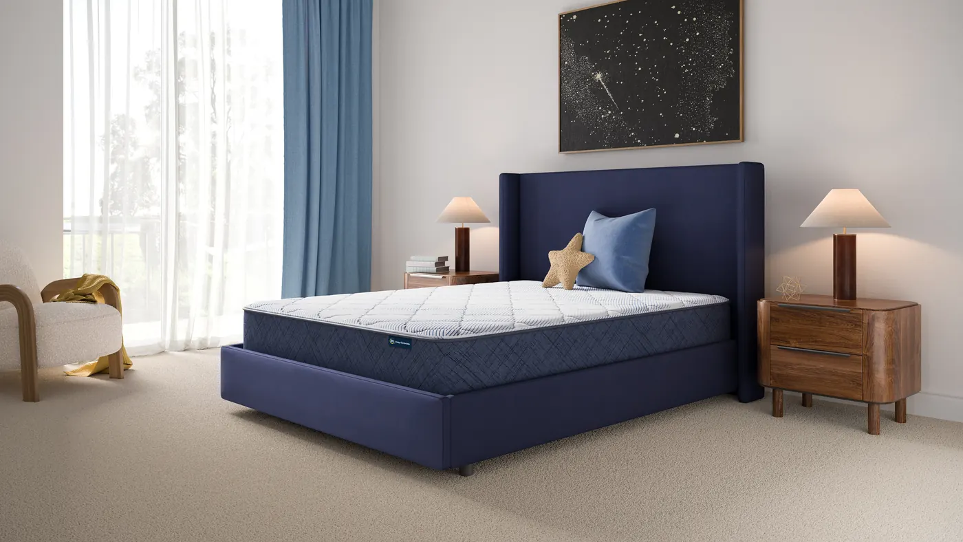 Serta® Perfect Day™ Overnight Firm 10″ in a bedroom